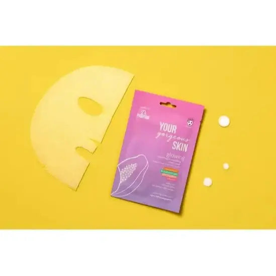 Dr. Paw Paw Your Gorgeous Skin Glowing Sheet Mask on yellow background with sheet mask and additional skincare items.