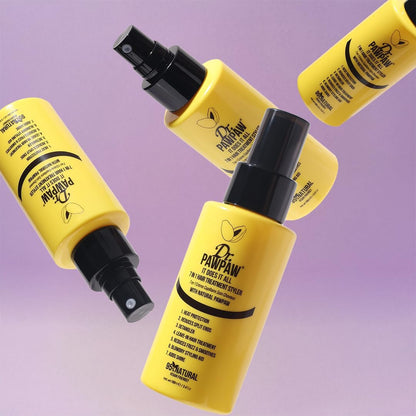 Yellow bottles with black nozzles on a purple background