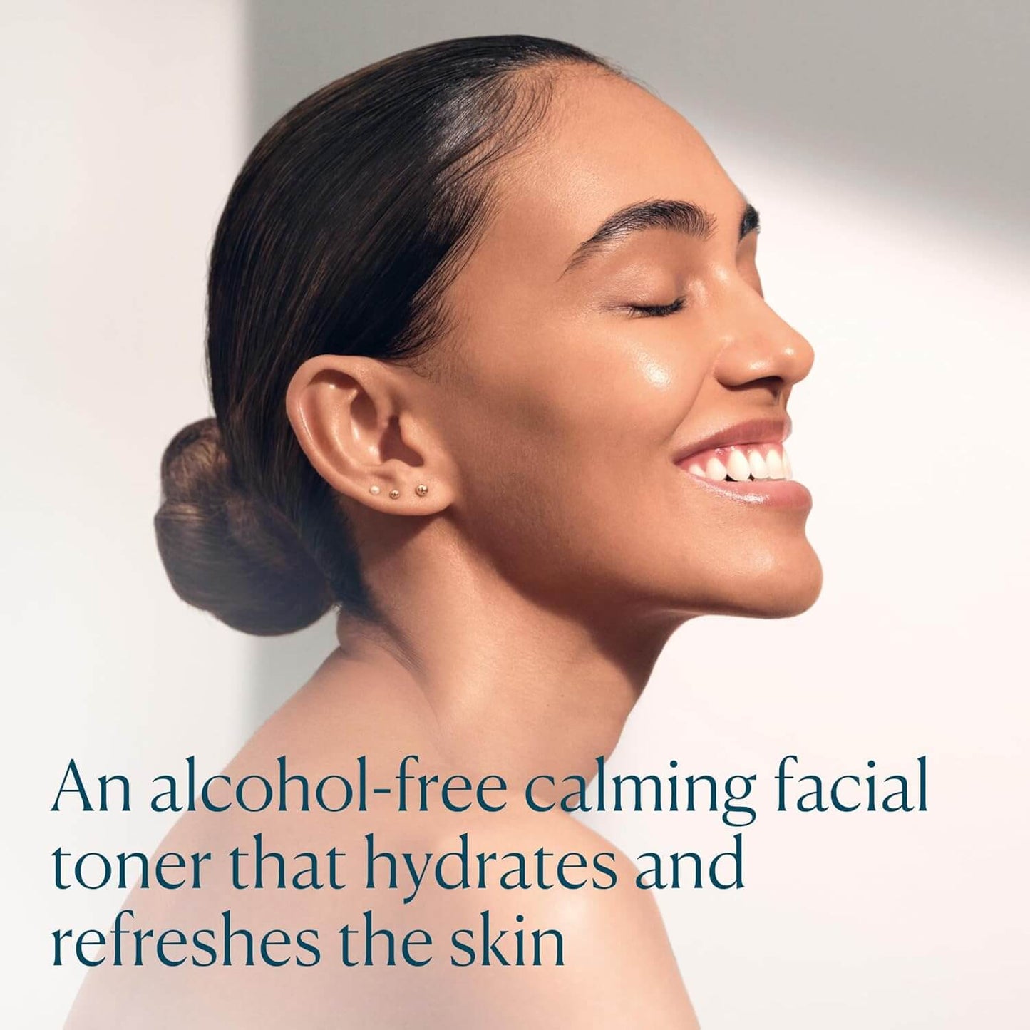 Woman with closed eyes and a serene expression, with text about an Elemis alcohol-free calming facial toner.