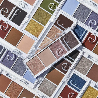 Multiple open eyeshadow palettes from the brand 'e.l.f.' showing a variety of colors.