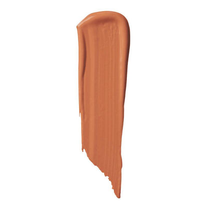 Swatch of e.l.f Camo Color Corrector in a warm peach shade, ideal for camouflaging redness and blemishes.