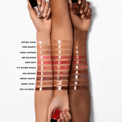 Swatches of e.l.f Glow Reviver Lip Oil shades showcasing colors: Crystal Clear, Pink Quartz, Coral Fixation, and more.