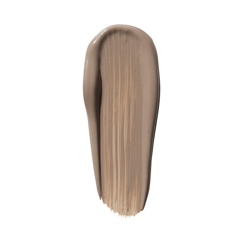 Swatch of e.l.f Halo Glow Contour Beauty Wand in a taupe shade, showcasing its creamy texture for a sculpted look.