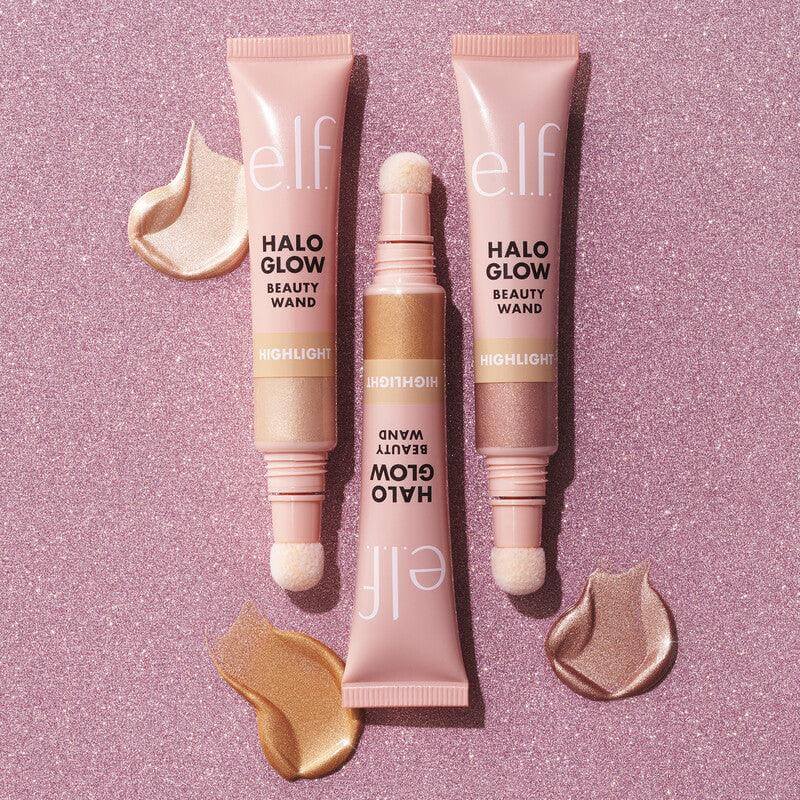 e.l.f Halo Glow Highlight Beauty Wand set with cushion-tip applicator, showcasing three liquid highlighters on pink background.