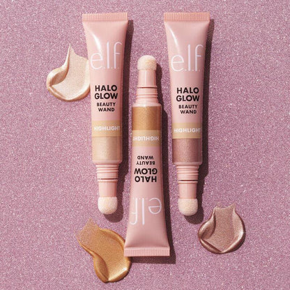 e.l.f Halo Glow Highlight Beauty Wand set with cushion-tip applicator, showcasing three liquid highlighters on pink background.