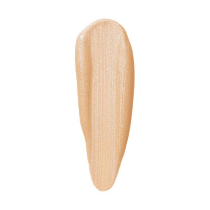 Swatch of e.l.f Halo Glow Liquid Filter in a light beige shade, showing a luminous, shimmery texture.