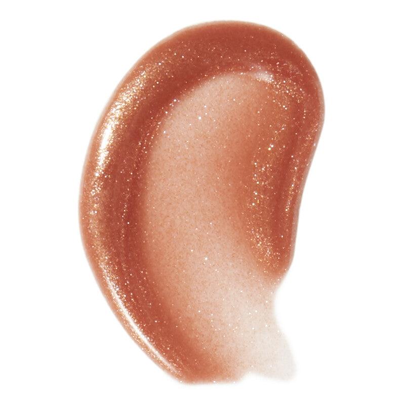 Swatch of e.l.f Lip Lacquer in a shimmering nude shade, showcasing its glossy finish and radiant color.