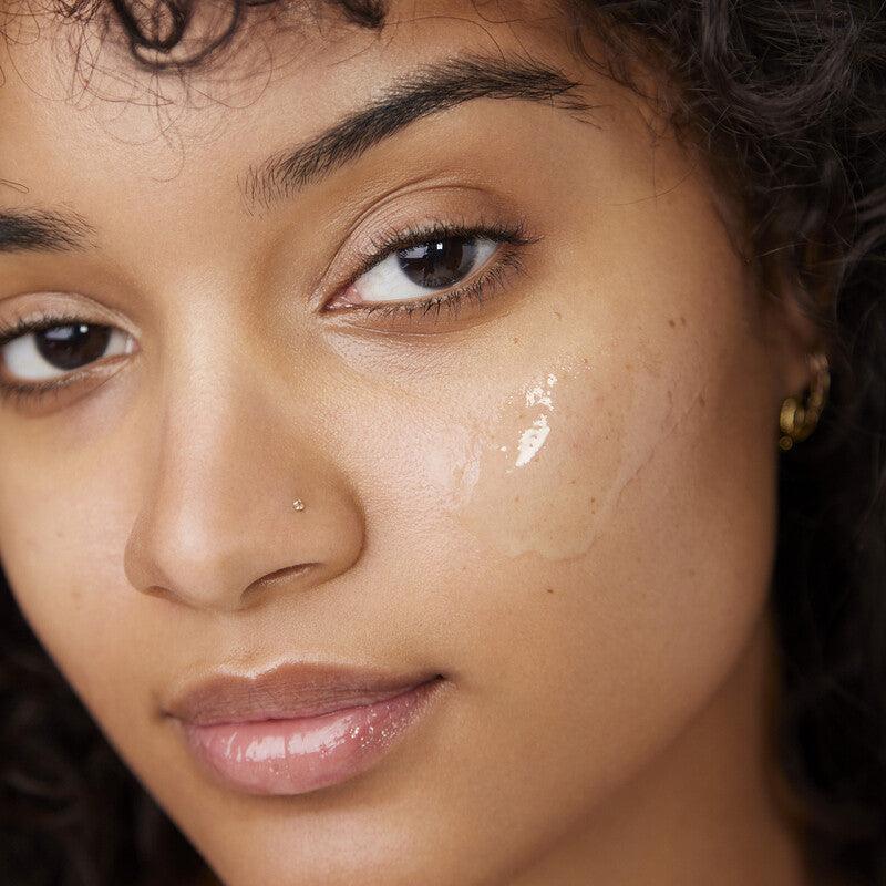 e.l.f Power Grip Primer applied on skin, showcasing a smooth, hydrating gel texture for a makeup-ready look.
