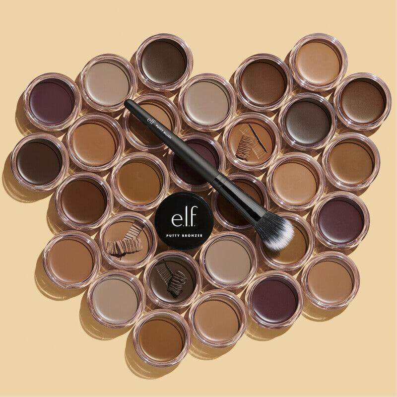 e.l.f Putty Bronzer shades arranged with a brush; a versatile bronzer for a sun-kissed glow.