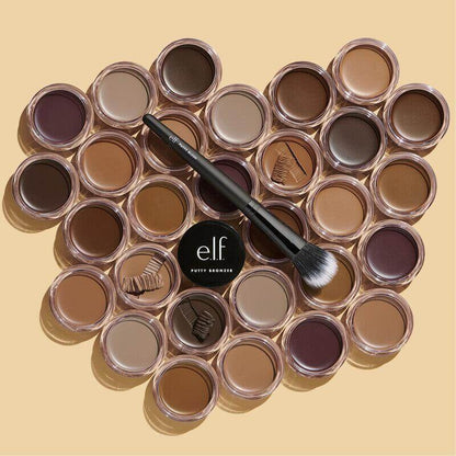 e.l.f Putty Bronzer shades arranged with a brush; a versatile bronzer for a sun-kissed glow.