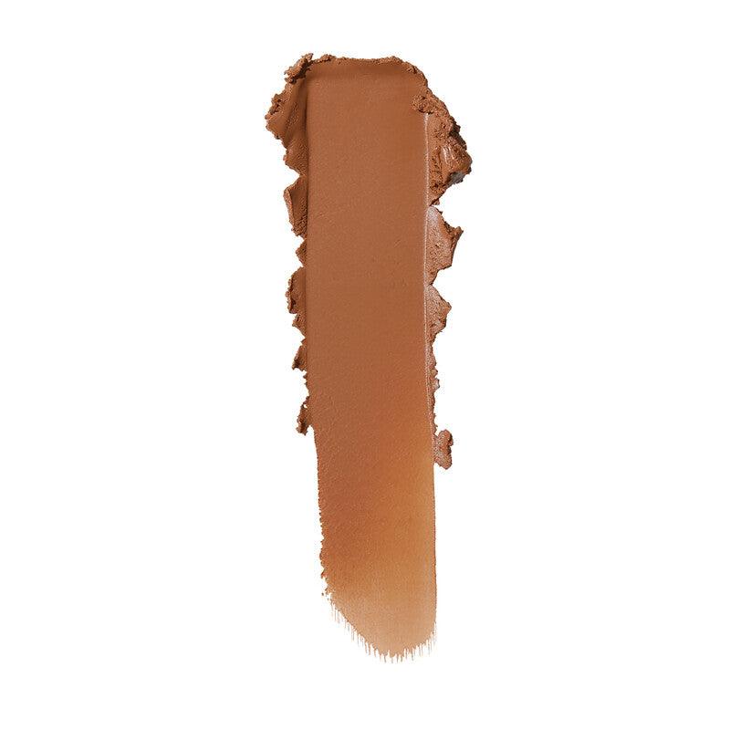 Swatch of e.l.f Putty Bronzer in a rich bronzed shade, showcasing its creamy texture and color.