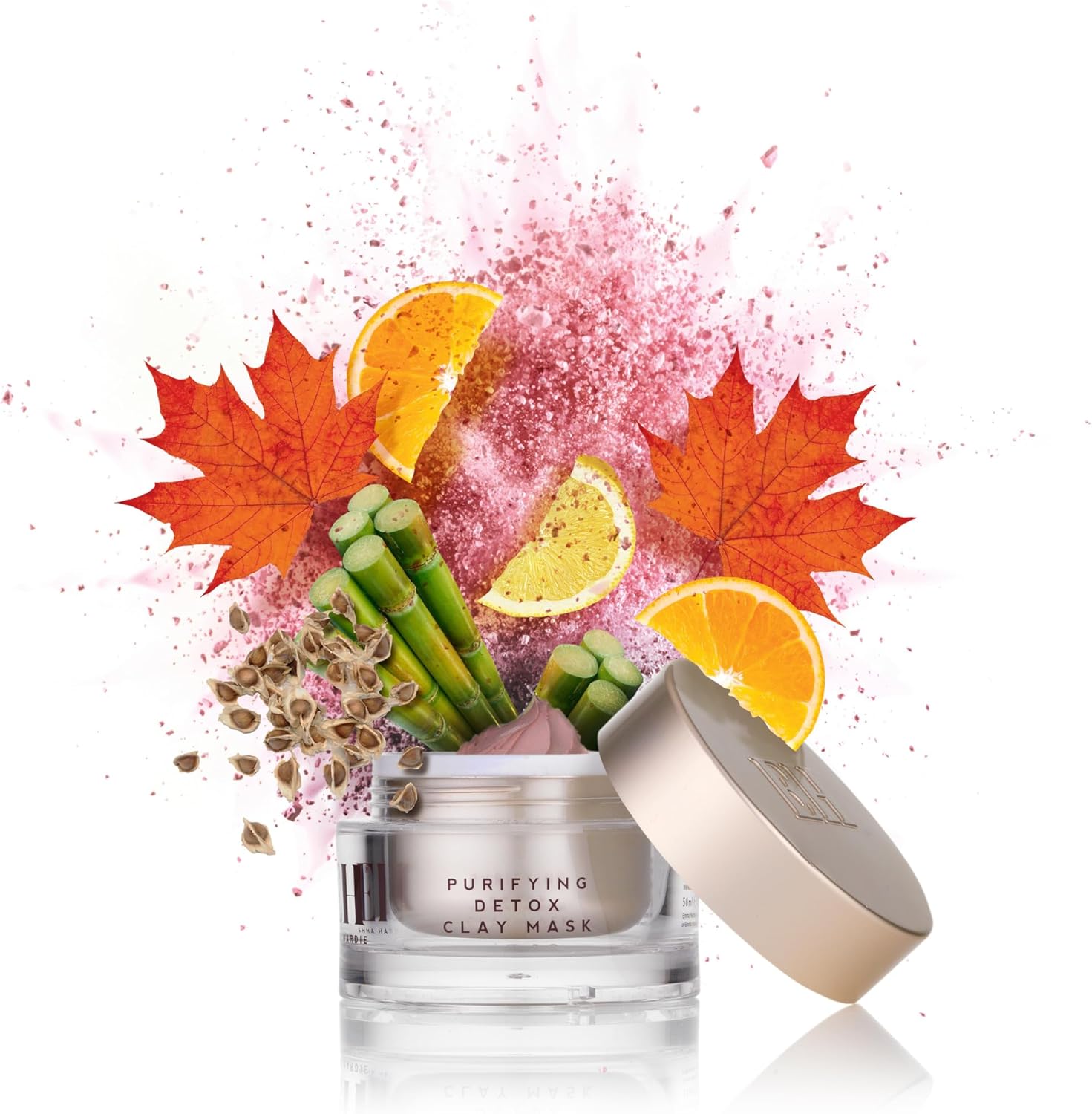 Emma Hardie Purifying Detox Clay Mask with autumn leaves, oranges, and bamboo on a white background