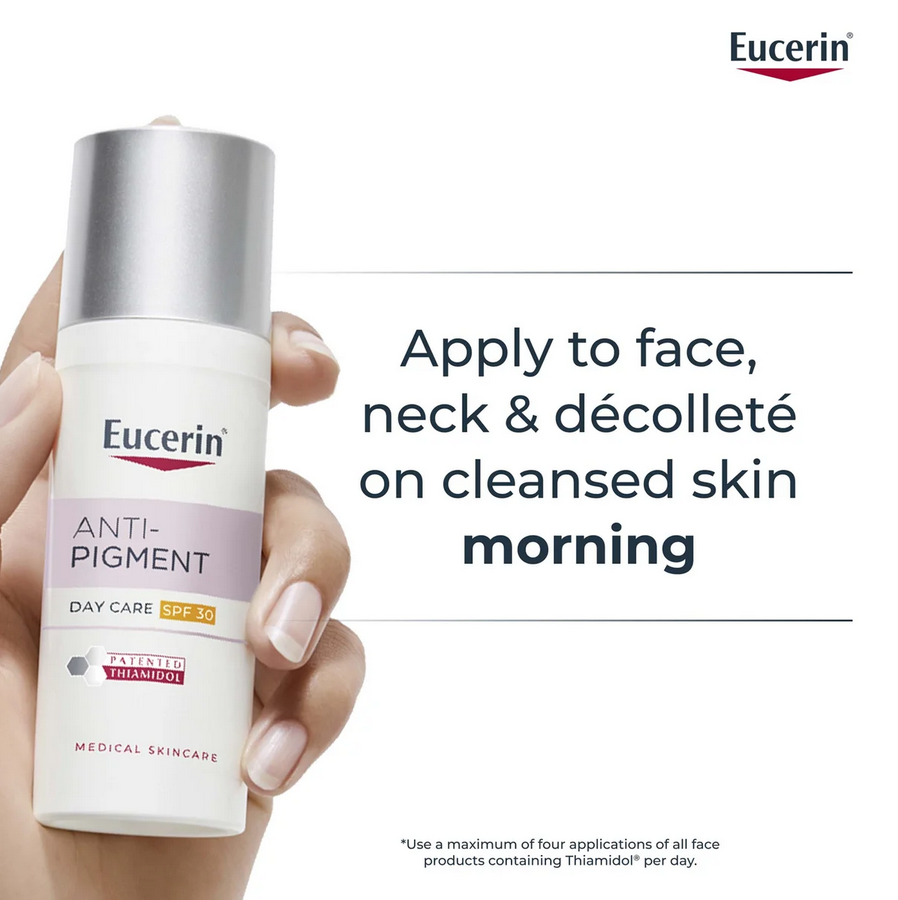 Eucerin anti-pigment day care cream bottle held by a hand with text on a white background