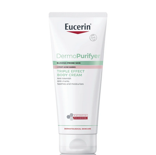 Eucerin DermoPure body cream tube on a white background