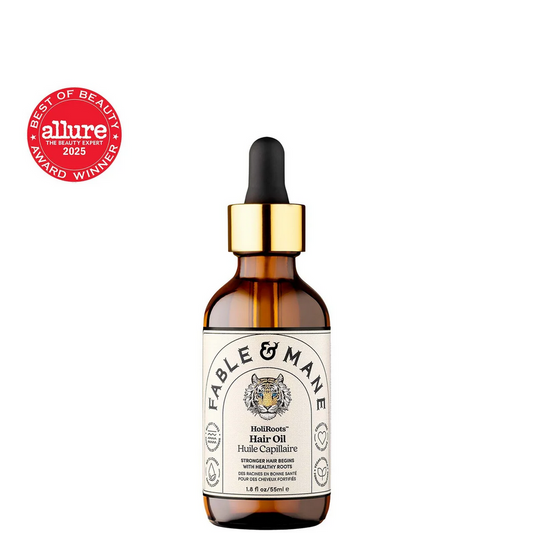 Fable & Mane hair oil bottle with dropper on a white background, featuring Allure Best of Beauty award.