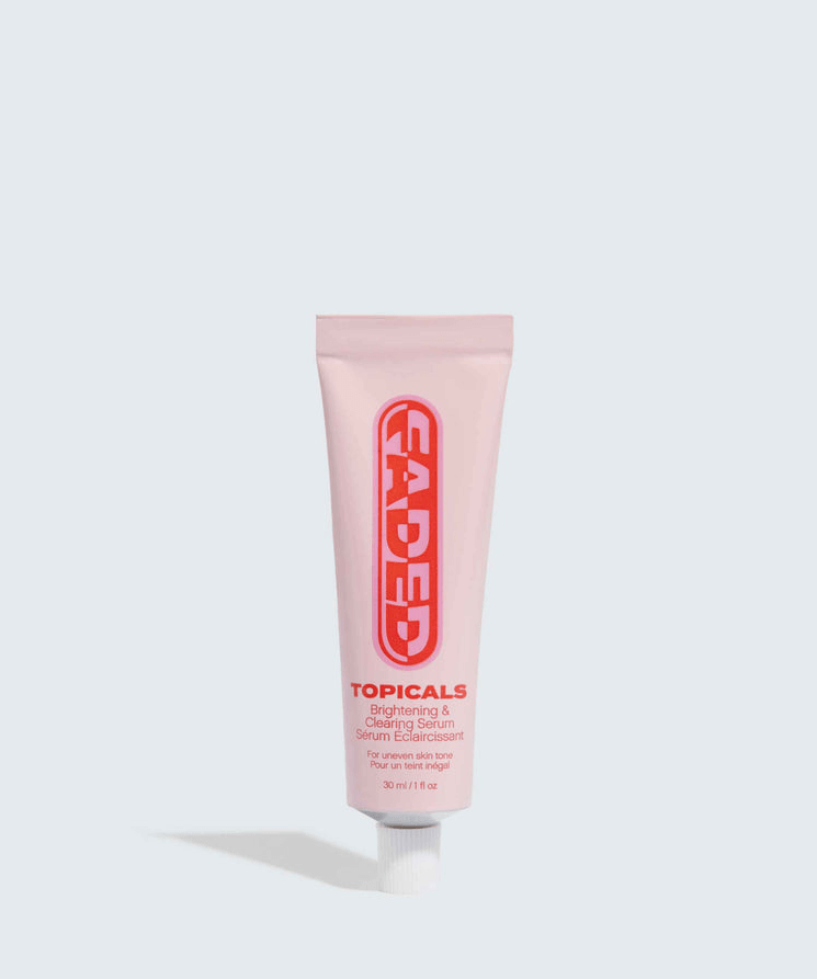 Faded Brightening + Clearing Serum For Dark Spots + Uneven Skintone in a pink tube with red text by TheGoodVibes.