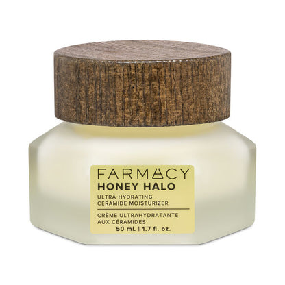 Farmacy Honey Halo moisturizer jar with wooden cap on a white background