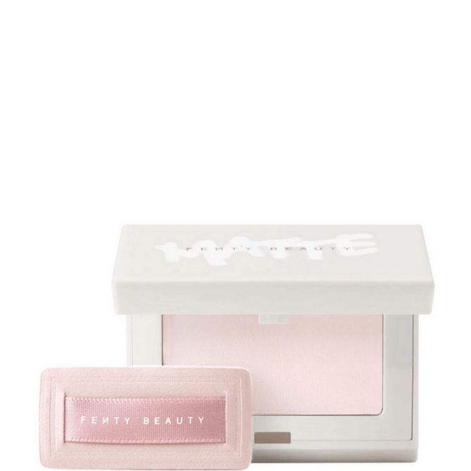 Fenty Beauty Mini Invisimatte Instant Setting + Blotting Powder in white compact with pink puff.