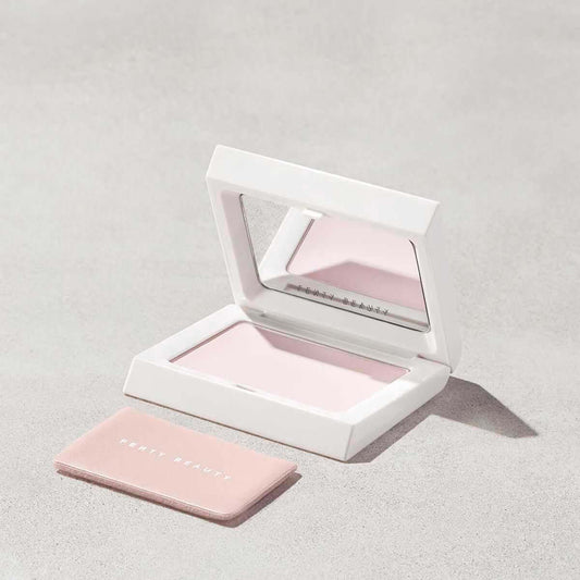 Fenty Beauty Mini Invisimatte Instant Setting + Blotting Powder in sleek compact with mirror, perfect for flawless matte finish.