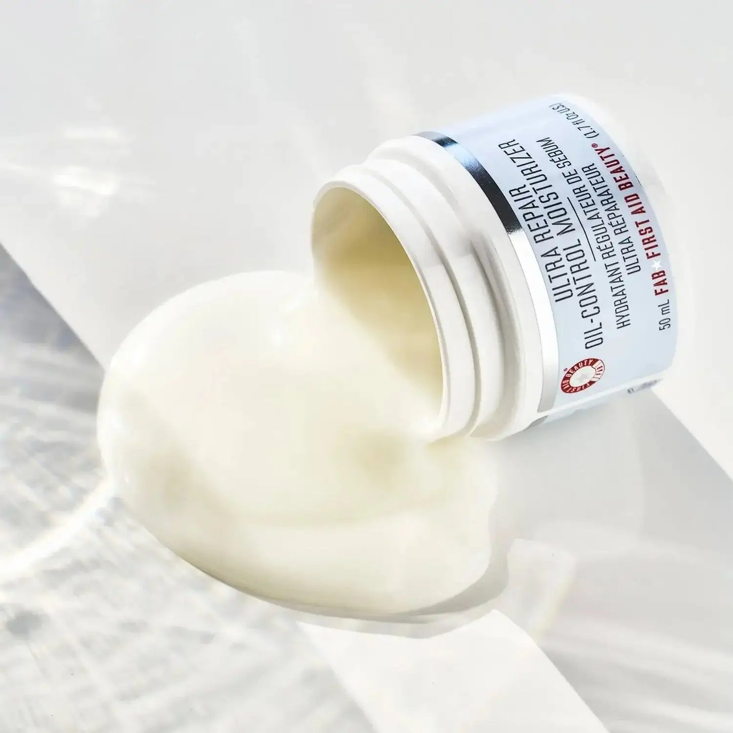 First Aid Beauty Oil-Control Moisturizer 50ml, oil-free formula, hydrating for oily skin, smooth consistency.