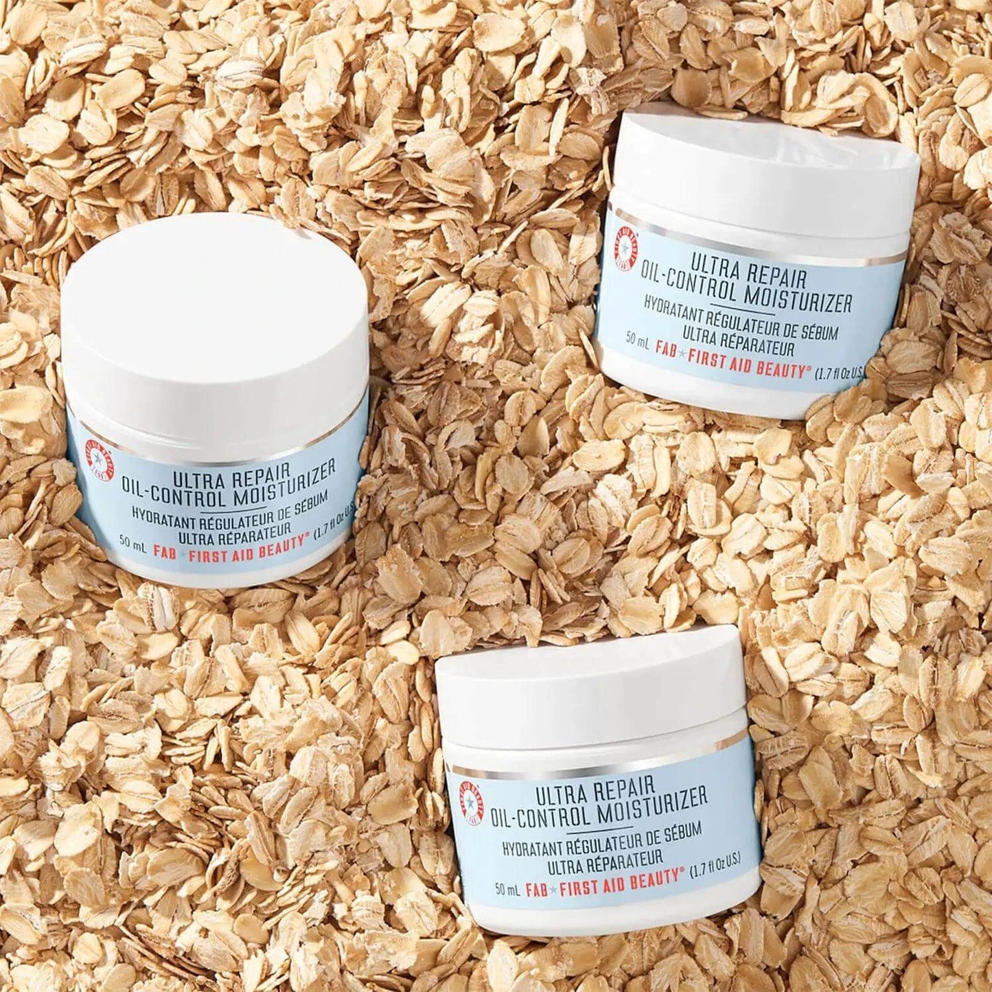 First Aid Beauty Oil-Control Moisturiser 50ml on an oat background, perfect for oily skin hydration without clogging pores.