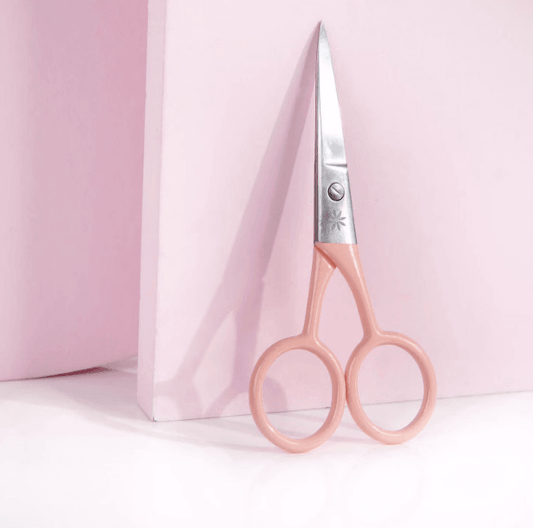 Brushworks Precision Straight Scissors on pink background, perfect for manicures and children's nail care.