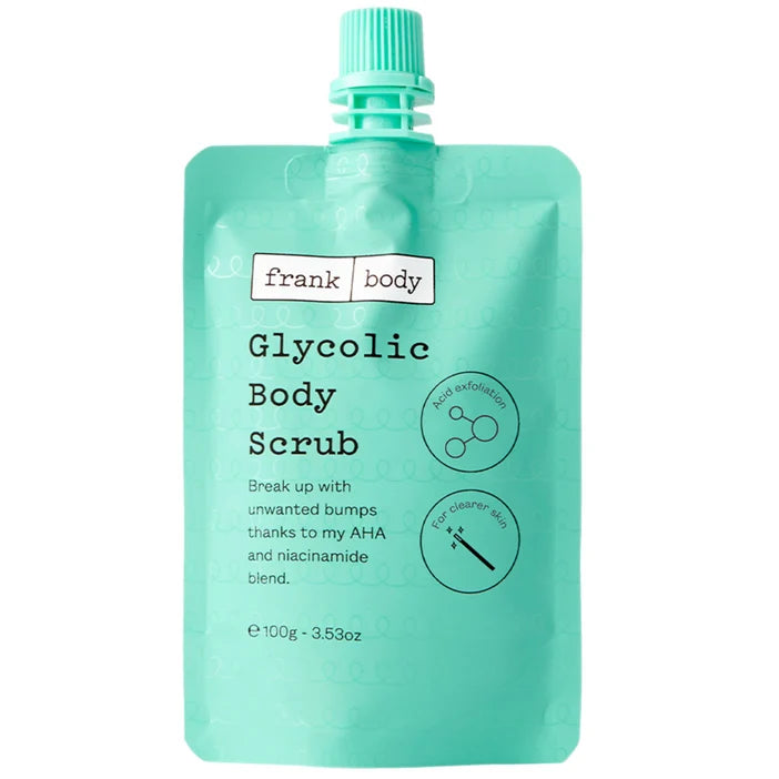 Green packet of frank body Glycolic Body Scrub on a white background