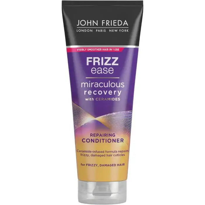 John Frieda Frizz Ease Miraculous Recovery conditioner tube on a white background