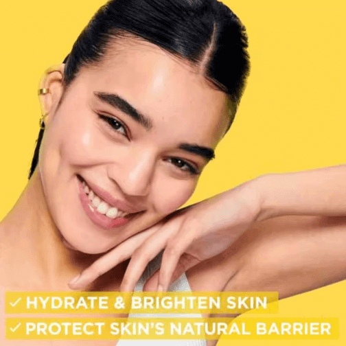 Smiling model showcasing hydrated and bright skin, promoting Garnier Skin Active benefits for natural moisture protection.