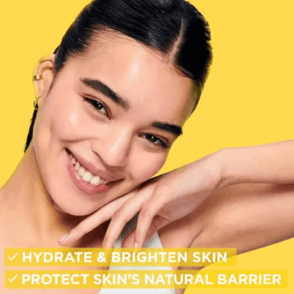 Smiling model showcasing hydrated and bright skin, promoting Garnier Skin Active benefits for natural moisture protection.