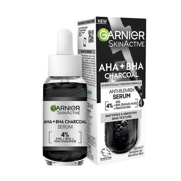 Garnier Skinactive 4% AHA BHA Charcoal Serum with Niacinamide, 30ml, improves skin texture and reduces blemishes.