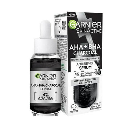 Garnier Skinactive 4% AHA BHA Charcoal Serum with Niacinamide, 30ml, improves skin texture and reduces blemishes.