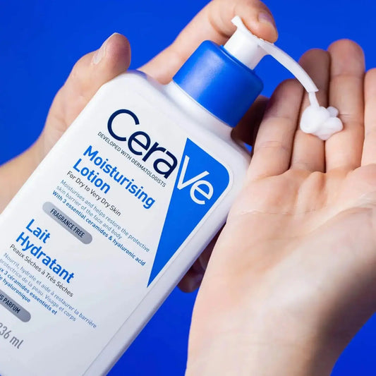 CeraVe Moisturising Lotion for dry skin being dispensed into a hand against a blue background, 236ml bottle.