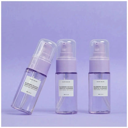 GLOW RECIPE Blueberry Bounce Gentle Cleanser bottles on a lavender background, showcasing a refreshing skincare product.