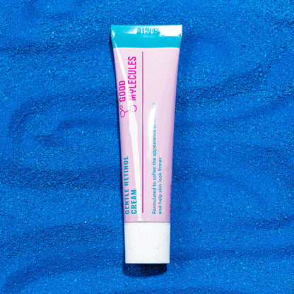 Good Molecules Gentle Retinol Cream tube on blue background, 30ml, for smoother, brighter skin.