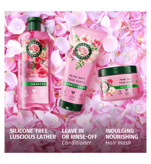 Herbal Essences Petal Soft Rose Scent shampoo, conditioner, and hair mask displayed with pink rose petals.