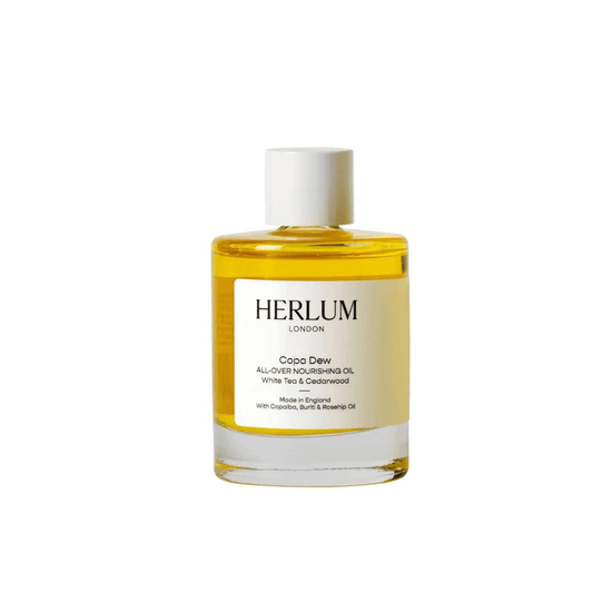 Herlum Copa Dew Oil 50ml bottle, an all-over nourishing oil for glowing skin and hair.