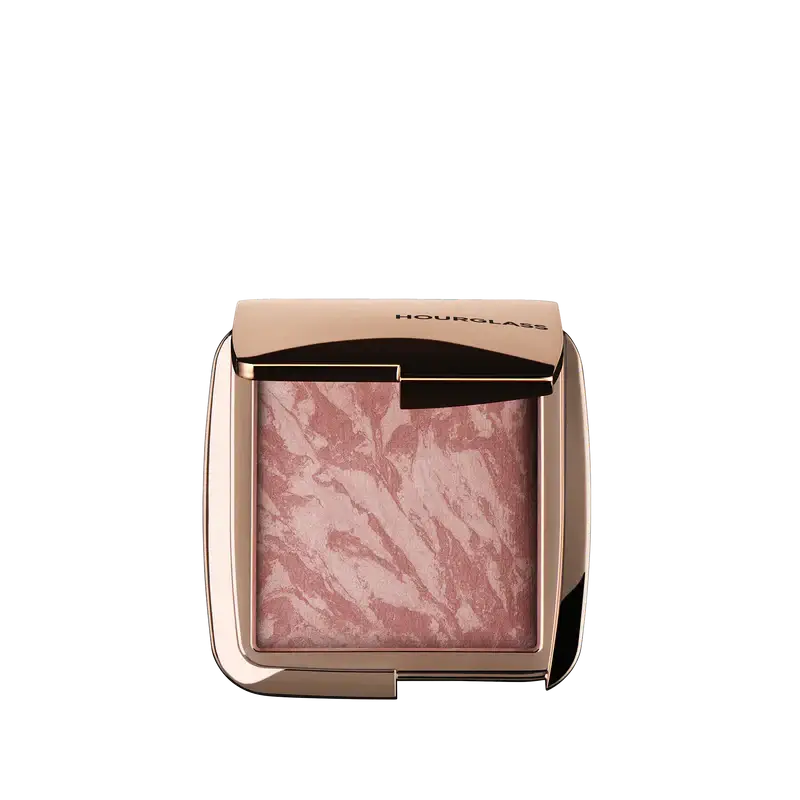 Hourglass Ambient Lighting Blush At Night in a sleek compact, showcasing a marbled pink hue for a radiant glow.