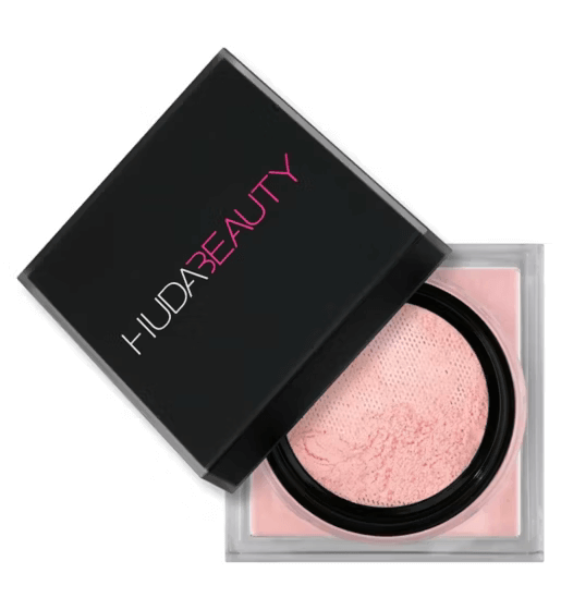 Huda Beauty Easy Bake Loose Setting Powder in sleek black packaging, showcasing smooth, pink powder for flawless makeup finish.