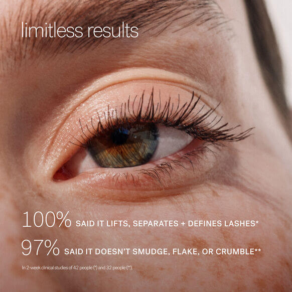 Close-up of an eye showcasing long, defined lashes; highlights results of ILIA Limitless Lash Mascara performance.