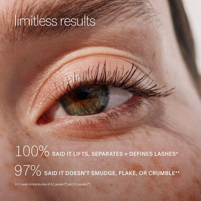 Close-up of an eye showcasing long, defined lashes; highlights results of ILIA Limitless Lash Mascara performance.