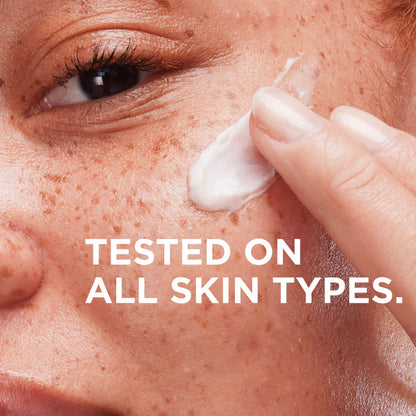 Person applying IT Cosmetics  cream to their face with text 'TESTED ON ALL SKIN TYPES.'