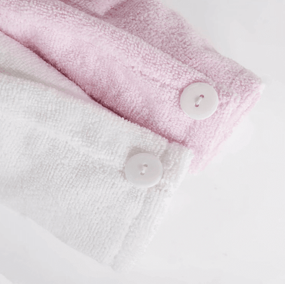Brushworks Hair Wrap showing soft microfiber fabric in pink and white with button fastening for secure wear.
