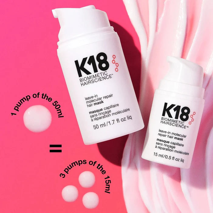 K18 biomimetic hairscience hair mask bottles on a pink background