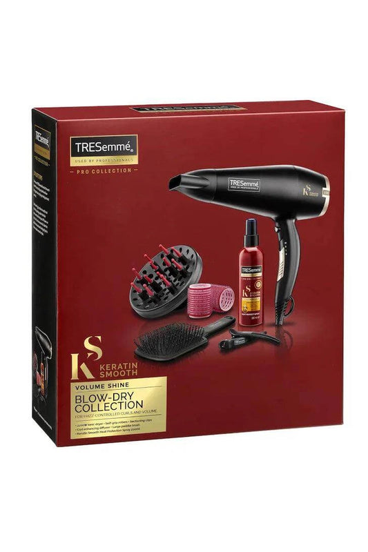 TRESemmé Salon Smooth Blow Dry Collection kit featuring a powerful hairdryer and styling tools for salon-quality results.