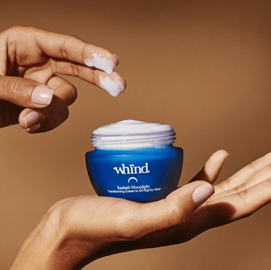 Kasbah Moonlight Overnight Recovery Cream in hand, showcasing its nourishing formula for nighttime skin rejuvenation.