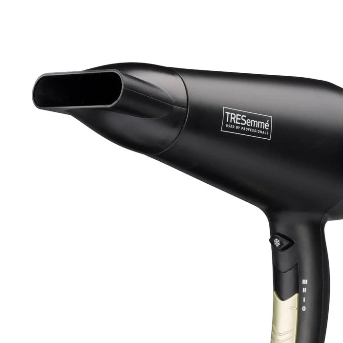 Black TRESemmé hair dryer on a white background