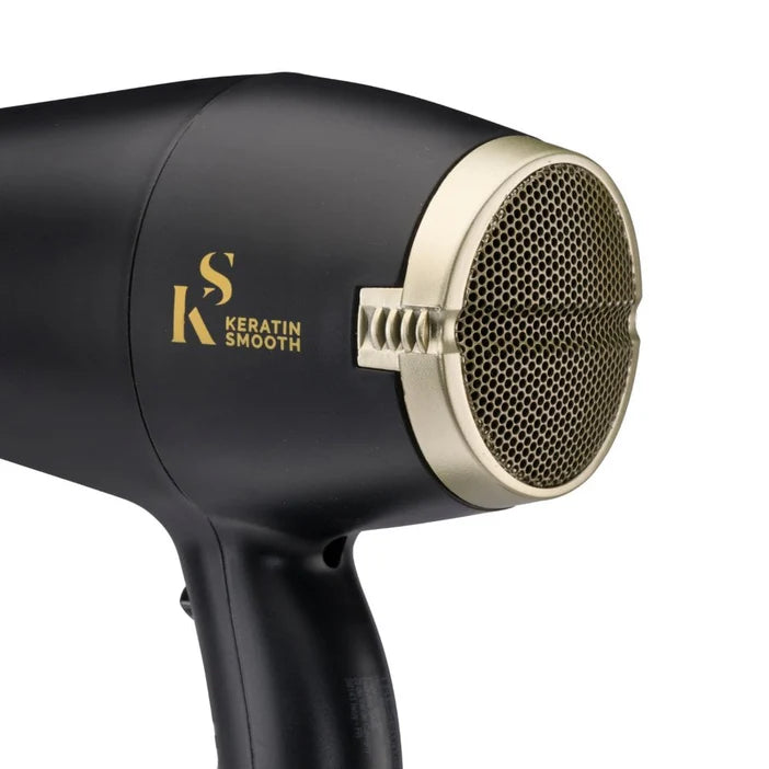 Black hair dryer with gold accents and 'Keratin Smooth' branding on a white background