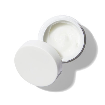 Kiehl's White cream jar with lid on a white background