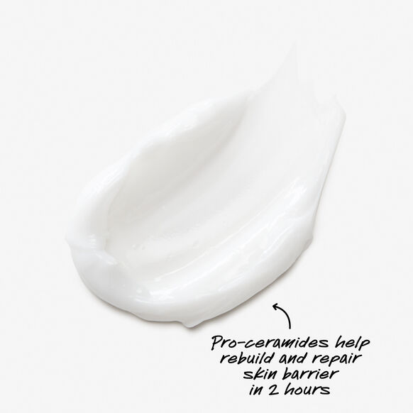 Close-up of a Kiehl's white skincare product with text on a white background